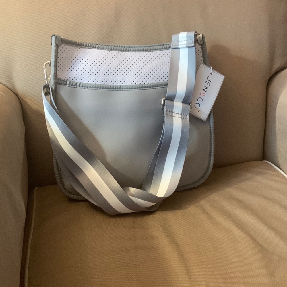 Neoprene purse with guitar strap
